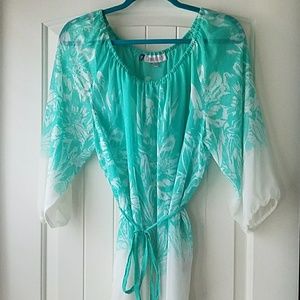 Jennifer Lopez sheer quarter sleeve blouse